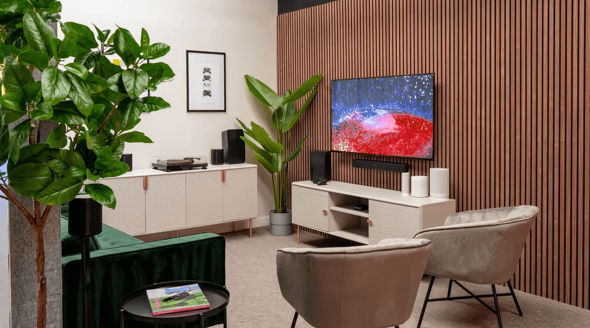 A photo of a modern living room space featuring smart speakers